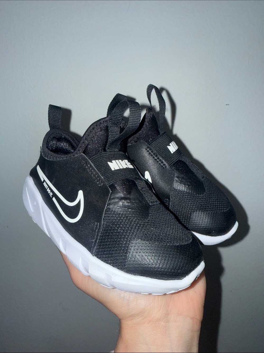 Nike Kids Black and White Slip-On Athletic Sneakers
